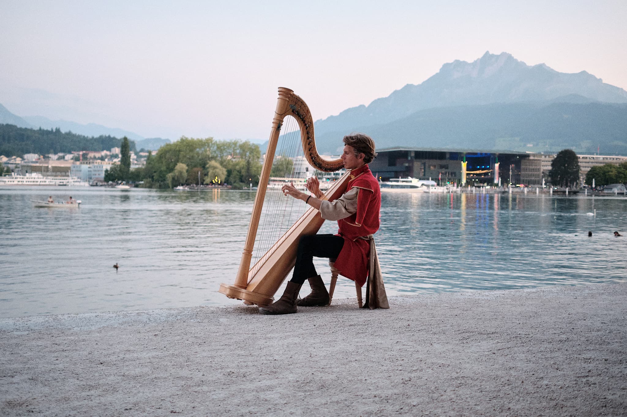 Strings whispering to the lake, as if mountains could listen